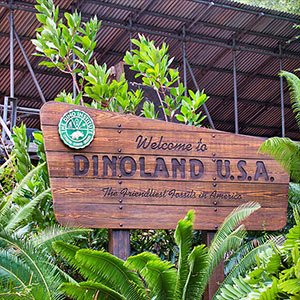 A sign for dino land.